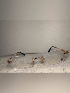 Chrome Hearts PILLS III Rimless Eyeglasses with Gold Accents and Black Temples